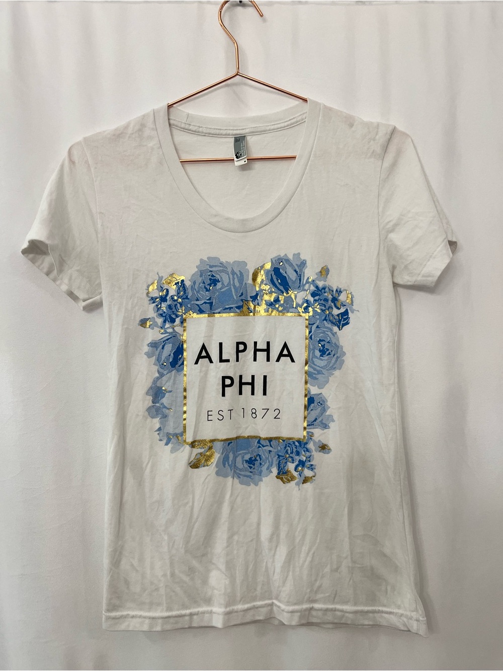 White Alpha Phi Graphic Tee with Blue flowers and gold details size medium